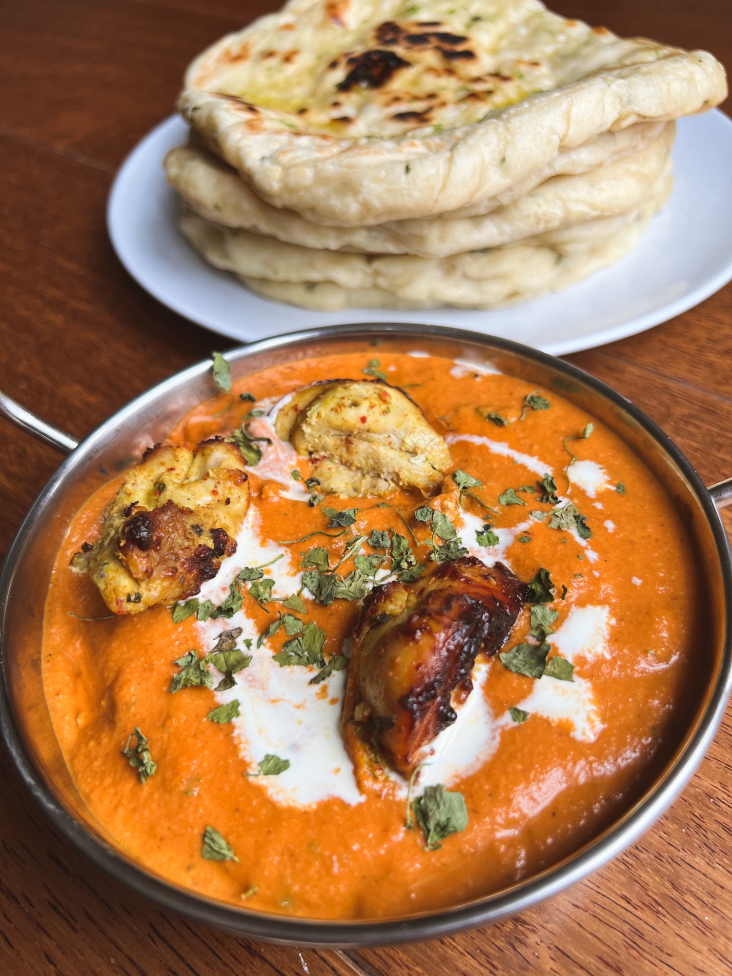 Butter chicken with rice and vegetables